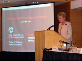 FWHA Administrator Mary E. Peters addresses participants at the National IVI Meeting held in Washington, DC, on June 25, 2003.