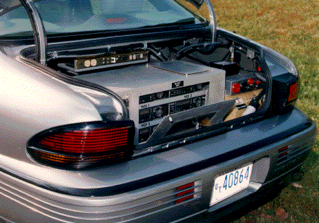 Testing and recording equipment in trunk.