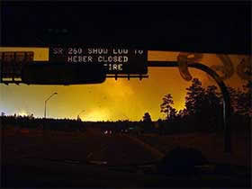 Photo: Photo showing an ADOT Information Board reading "SR260 Show Low to Heber Closed" due to the Rodeo Chediski Fire