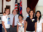 Rep. Abercrombie with Sydney Inouye, Hawaii’s winner for "Tar Wars" poster contest, and her family