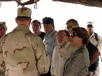 Congressman Neil Abercrombie and other Members of Congress being briefed on security conditions during a May 2003 fact-finding visit to Iraq. (Press Release)