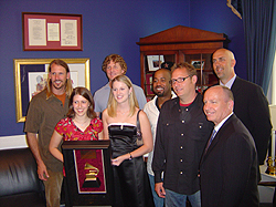 Representatives from Klein High School Music Department accept a Grammy award from Grammy representatives, band Hootie and the Blowfish.