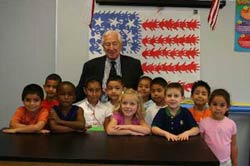 Congressman Hall and children at Fowler Elementary display their mural.