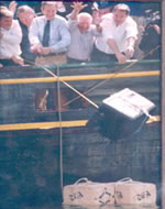 As a member of the House of Representatives, Crapo joined with several other House members to toss the U.S. Tax Code into the Boston Harbor in a re-enactment of the Boston Tea Party, April 15, 1997.