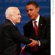 John McCain, left, and Barack Obama shake hands after first presidential debate (26 Sep 08)