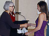Photo of  Sandia Director, Pat Smith, presenting an award at the 2008 Math and Science Awards Banquet hosted by Sandia