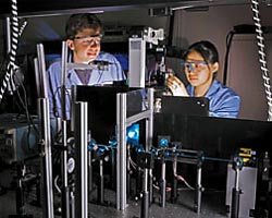 Photo of Sandia researchers Thomas Perroud and Meiye Wu