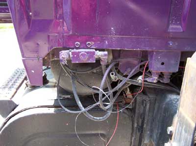 Photo 7: Picture of air tank shared by brake lines and tailgate system 