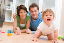 Photo: Parents with crawling baby