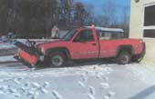 Pickup truck equipped with a snowplow