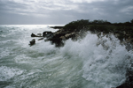Photo: Ocean waves breaking against the shore