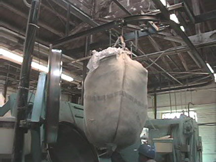 Exhibit #5. View of the laundry sling used to deliver laundry to the machine.