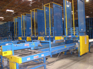 Exhibit #1. View of the pallet stackers from the front or loading end.