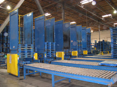 Exhibit #2. View of the pallet stackers from the rear or unloading end.