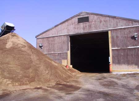 Figure 4. Storage shed from which front-end loader emerged, striking victim.
