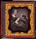 Daguerreotype portrait of a woman working at a 
sewing machine.[c 1853]