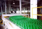 Bottle depalletizer/bottle conveyor line at a soft drink bottling plant. 
