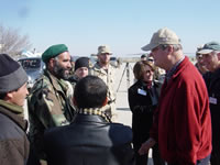 Image of Congressman with Soldiers