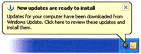 A Windows Update bubble stating New updates are ready to install