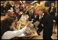 Lynne Cheney greets customers at El Burrito Mercado, a grocery store and cafeteria in the heart of St. Paul's Latino commercial district, in St. Paul, Minn., Monday, Feb. 23, 2004. White House photo by David Bohrer.