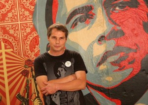 Shepard Fairey with his "Hope" portrait, Courtesy of Jill Greenberg