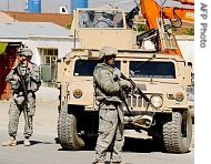 US soldiers block a road as they stand guard at the site of a suicide attack in Kabul, 29 May 2008 (file photo)