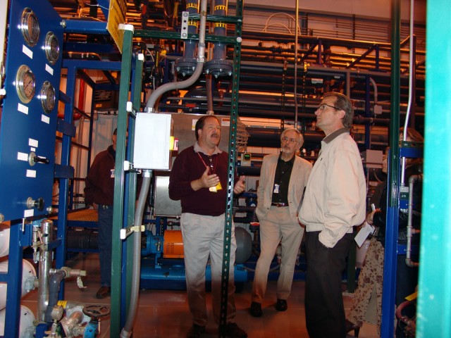 Steve Hanson of Radioactive Liquid Waste (NWIS-RLW), describes to visitors how the SERF operates during a tour of the facility on Tuesday. Among those on the tour was John Immele, the Lab's deputy director for national security.
