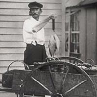 Ocean city fish monger Hazard Taylor displaying his wares, 1913