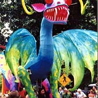 Puppeteer Mark Jenks participates in parade entry Alebrije ("Magical Vision")