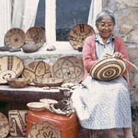 Viola Jimulla with some of her baskets, c. 1960