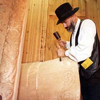 Woodcarver Phillip Odden demonstrates his woodcarving skills at Hostfest, November 1996