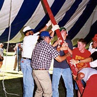 Plainview residents of all ages help to erect the Chautauqua tent , July 1999