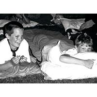 Two boys in sleeping bags at the "Ghosting," June 1998