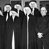 Original pioneering group of Sisters with Father Moran