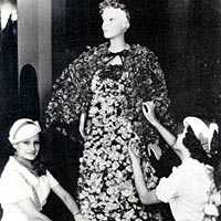 Dress completely covered with live rose blooms was worn in the Texas Rose Festival of 1934
