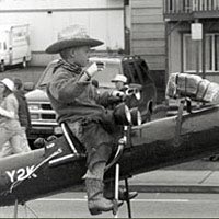 Boy riding rocket in Loyalty Days Parade, May 1999