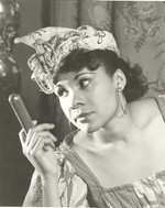 Katherine Dunham in an undated photograph as Woman with a Cigar from Tropics [photograph]