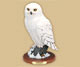 Owl sculpture featured in the auction.