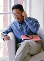 Photo: A healthcare professional using communication devices