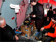 Filmmaker Anne Aghion, center, cooks up lunch for her film crew and a team of scientists working in the McMurdo Dry Valleys in 2006.