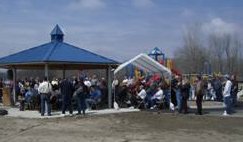 Picture of a number of people gathered for the Grand Opening Ceremonies.