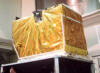 The MISR instrument is shown seated on the end bell of the thermal vacuum chamber in JPL's 3-meter Space Simulator Facility. Testing was completed in mid-May 1997, and verified the instrument performance over a range of temperatures.<p><i>Photograph by Barbara Gaitley, JPL image P-28825A.