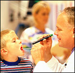 Photo: A healthcare professional and his young patient.