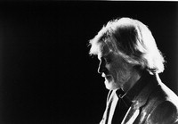 [Gerry Mulligan in profile with black background] [photograph]