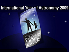 International Year of Astronomy 2009 logo showing the figures of an adult and child looking up at the night sky