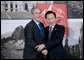 President George W. Bush and President Lee Myung-bak of the Republic of Korea pause for photographers Saturday, Nov. 22, 2008, prior to their meeting in Lima, Peru, site of the 2008 APEC Summit. White House photo by Eric Draper