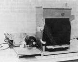 Photograph of Waco Saw and Seam projector for examining cross-sections of double seams
