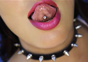 image of young lady with pierced tounge