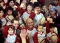 Hines Ward waves along with children of mixed racial origin during their meeting in Seoul, Korea