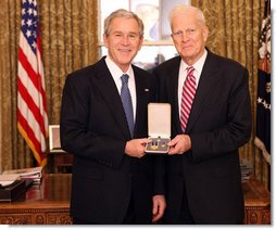 President George W. Bush stands with James Billington after presenting him with the 2008 Presidential Citizens Medal Wednesday, Dec. 10, 2008, in the Oval Office of the White House. White House photo by Chris Greenberg